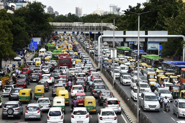 Scientific American reports that electric vehicle adoption is not happening fast enough to meet carbon reduction goals by 2050. Photo shared by Drive Electric Dayton.