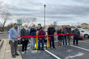 Photos of ribbon-cutting at Kroger EV charging station event