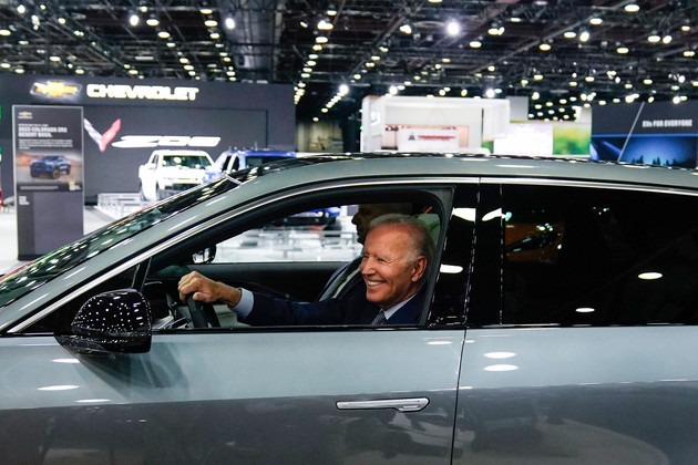 President Biden test drives an electric car. Photo by Politico/Associated Press shared by Drive Electric Dayton