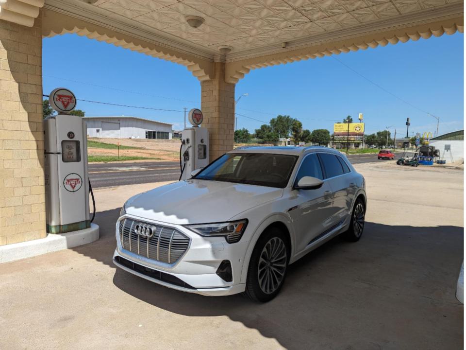 New tech meets old tech: our EV parked at a restored historic gas station
